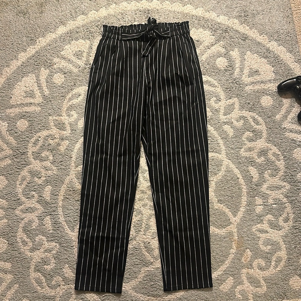 White strapped trousers
